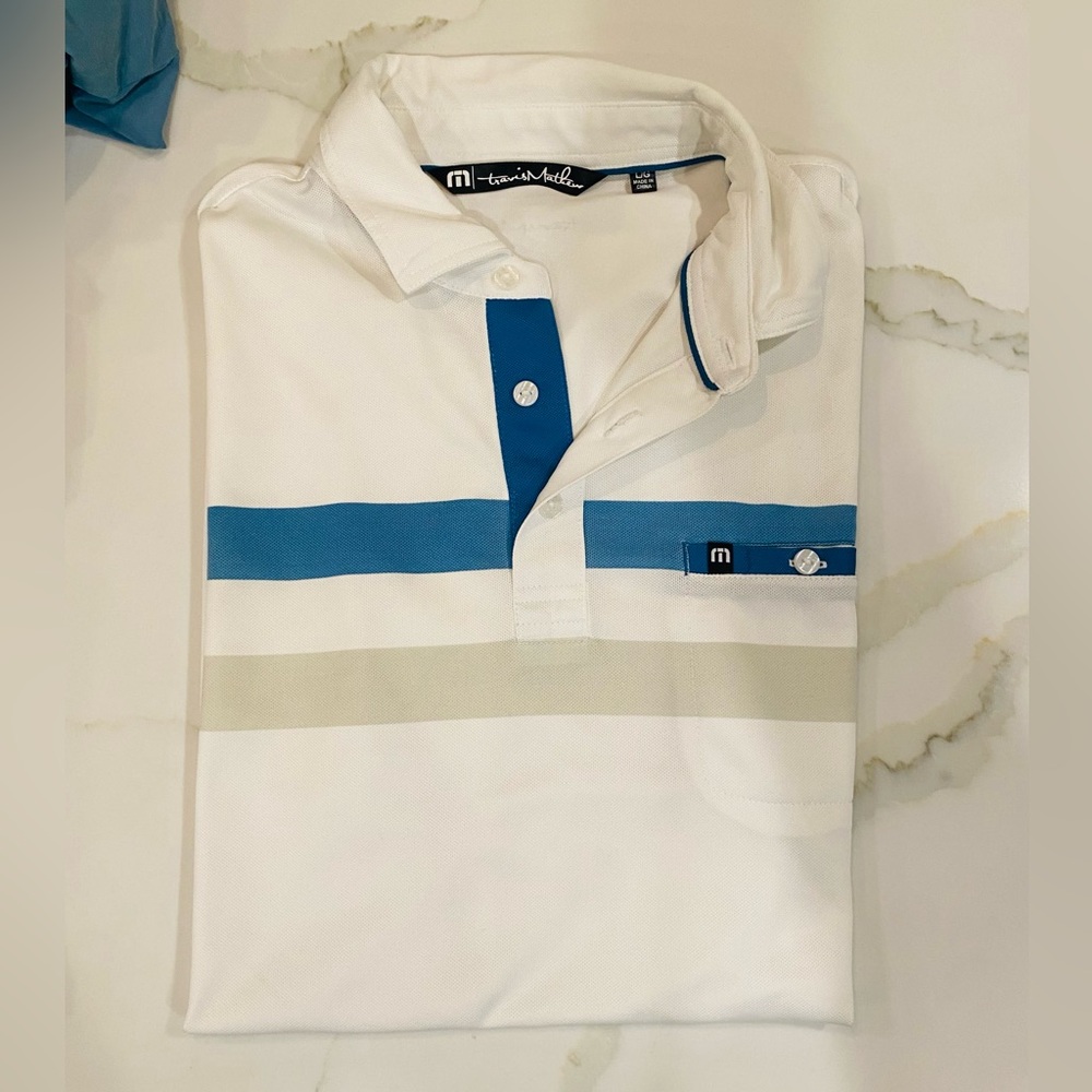 Travis Mathew White Polo with Blue & Neutral Chest Stripes & Front Pocket, Large